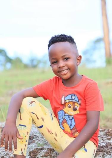 Prince Africa, Mr Masaka smiling outdoors